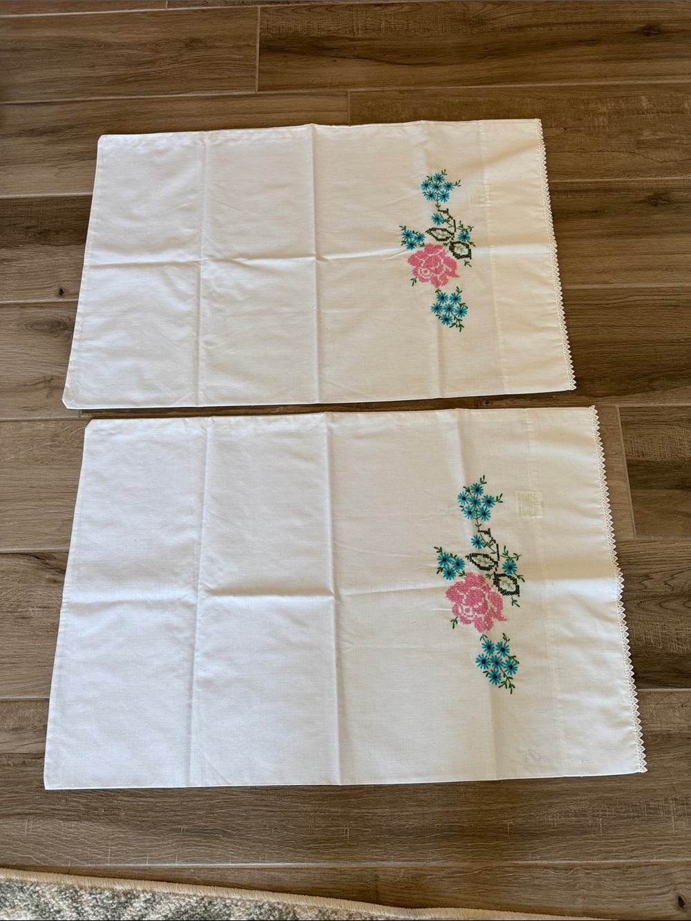 Vintage Dan River Muslin pillowcase set of 2 hand cross stitched flowers